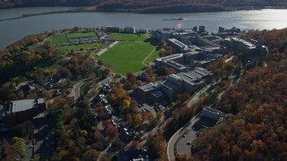 AX119_174E - 5.5K aerial stock footage of circling the West Point Military Academy campus in Autumn, West Point, New York