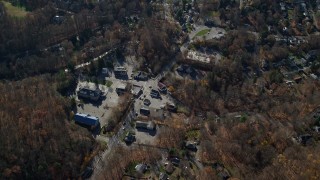AX119_194 - 5.5K aerial stock footage of small town streets and shops in Autumn, Putnam Valley, New York