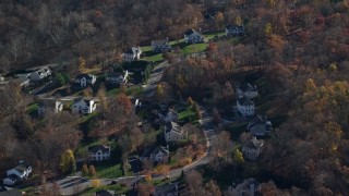 AX119_195 - 5.5K aerial stock footage of a quiet residential neighborhood in Autumn, Mohegan Lake, New York