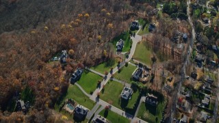 AX119_204E - 5.5K aerial stock footage of a bird's eye view of suburban homes in Autumn, Yorktown Heights, New York