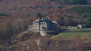AX119_216E - 5.5K aerial stock footage of an isolated mansion on a hill in Autumn, Mt Kisco, New York