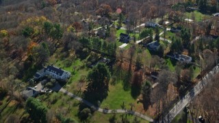 AX119_218 - 5.5K aerial stock footage fly over upscale suburban neighborhood in Autumn, Mt Kisco, New York