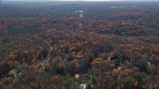 AX119_219E - 5.5K aerial stock footage of flying over a rural neighborhood in Autumn, Mt Kisco, New York