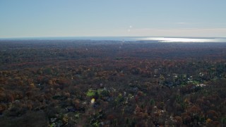AX119_226 - 5.5K aerial stock footage of an upscale residential neighborhood in Autumn, Greenwich, Connecticut