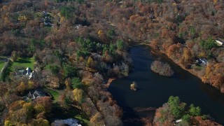 AX119_227 - 5.5K aerial stock footage orbit waterfront mansions in Autumn, Greenwich, Connecticut