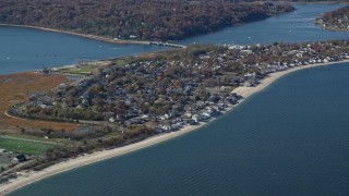 AX119_238 - 5.5K aerial stock footage orbit is small town beachfront homes in Autumn, Bayville, New York