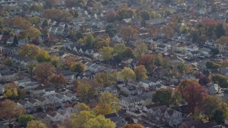 AX120_041E - 5.5K aerial stock footage of suburban tract homes in Autumn, Queens Village, Queens, New York City