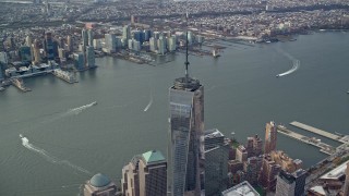 AX120_100E - 5.5K aerial stock footage of approaching the top of Freedom Tower in Lower Manhattan, New York City