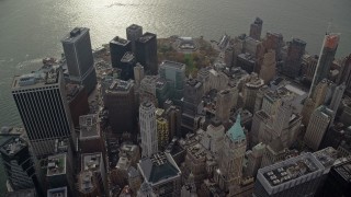 AX120_107 - 5.5K stock footage aerial video orbit skyscrapers and Battery Park in Lower Manhattan, New York City