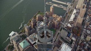 AX120_109E - 5.5K aerial stock footage approach the Freedom Tower spire in Lower Manhattan, New York City