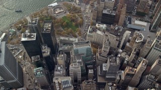 AX120_117E - 5.5K aerial stock footage bird's eye of skyscrapers, reveal Battery Park in Lower Manhattan, New York City