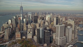 AX120_123E - 5.5K stock footage aerial video of flying toward Battery Park and Lower Manhattan in Autumn, New York City