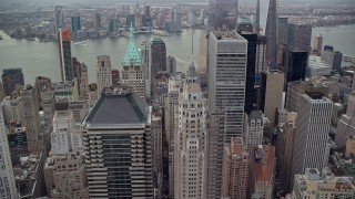 AX120_148 - 5.5K stock footage aerial video approach and orbit skyscrapers in Lower Manhattan, New York City