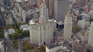 AX120_150 - 5.5K aerial stock footage orbit Manhattan Municipal Building in Autumn, Lower Manhattan, New York City