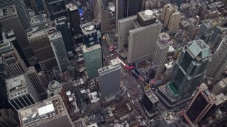 AX120_176E - 5.5K aerial stock footage orbit Times Square and Broadway in Midtown, New York City