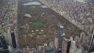 AX120_181 - 5.5K stock footage aerial video orbit Central Park in Autumn, New York City