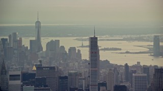 AX120_227 - 5.5K stock footage aerial video of 432 Park Ave, Empire State Building and Freedom Tower in New York City