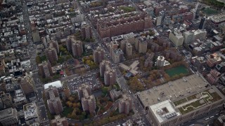 AX120_238 - 5.5K aerial stock footage approach Penn South apartment buildings in Chelsea in Autumn, New York City