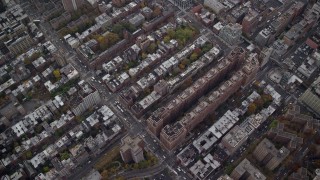 AX120_239E - 5.5K aerial stock footage of a bird's eye view of Chelsea apartment buildings in Autumn, New York City