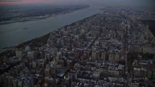 AX121_093E - 5.5K aerial stock footage of apartment buildings on the Upper West Side at twilight in New York City
