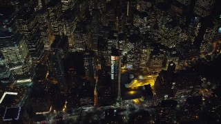 AX121_182 - 5.5K stock footage aerial video of a bird's eye view of Lower Manhattan at Night, New York City