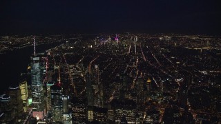 AX121_185E - 5.5K aerial stock footage of Midtown seen from Freedom Tower at Night in New York City