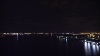 AX122_001 - 5.5K aerial stock footage flyby oil refineries on the shore of Newark Bay at Night in New Jersey