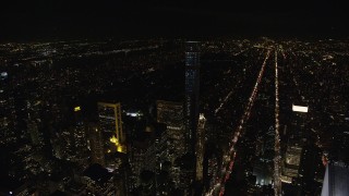 AX122_209E - 5.5K aerial stock footage approach and orbit 432 Park Avenue skyscraper at Night in Midtown Manhattan, New York City