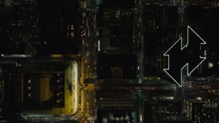 AX122_227 - 5.5K aerial stock footage of a bird's eye view of 42nd Street through Midtown, reveal Grand Central at Night, NYC