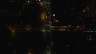 AX122_231E - 5.5K aerial stock footage of a bird's eye of 2nd Avenue in Gramercy and East Village at Night in New York City