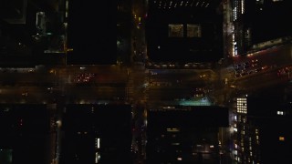 AX122_248E - 5.5K aerial stock footage of a bird's eye view of Houston Street at Night in Soho, New York City