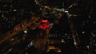AX123_093E - 5.5K aerial stock footage approach Williamsburgh Savings Bank building at Night in Brooklyn, New York City