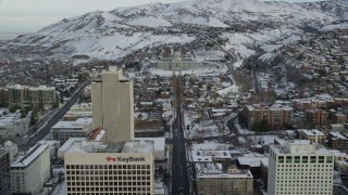 AX124_216 - 5.5K stock footage aerial video approach Utah State Capitol from Downtown in winter at sunrise, Salt Lake City