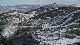 AX126_129 - 5.5K aerial stock footage approach the ski runs on snowy slopes at Deer Valley in Park City, Utah