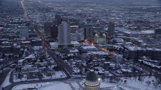 AX128_023 - 5.5K stock footage aerial video fly over Utah State Capitol toward church buildings and temple with snow at twilight, Downtown Salt Lake City
