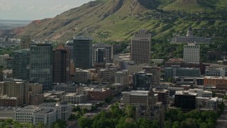 AX129_014E - 5.5K aerial stock footage of flying by State Street, Main Street, city buildings, Downtown Salt Lake City, Utah