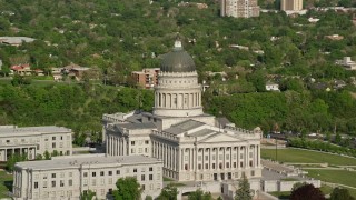 AX129_018 - 5.5K aerial stock footage of flying by the Utah State Capitol on Capitol Hill, Salt Lake City, Utah