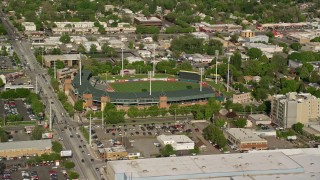 AX129_026 - 5.5K aerial stock footage of Spring Mobile Ballpark during a baseball game, Salt Lake City, Utah