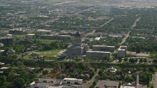 AX129_037E - 5.5K aerial stock footage of Utah State Capitol, Temple Square, downtown buildings, Salt Lake City, Utah