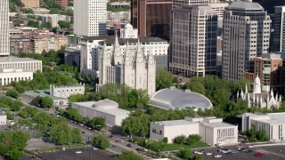 AX129_044 - 5.5K aerial stock footage of orbiting Salt Lake Temple, Mormon Tabernacle, Downtown Salt Lake City, Utah