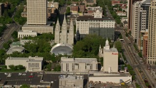 AX129_045 - 5.5K stock footage aerial video of circling Salt Lake Temple, Mormon Tabernacle,  Downtown Salt Lake City, Utah