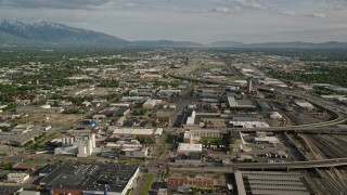 AX129_046E - 5.5K aerial stock footage of flying over streets and buildings, approach Interstate 15, Salt Lake City, Utah