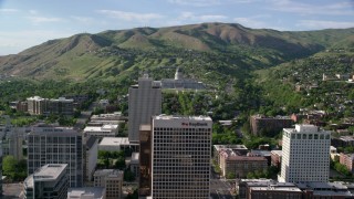 AX129_054 - 5.5K stock footage aerial video approach Utah State Capitol from city buildings, Downtown Salt Lake City, Utah