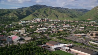 AX129_066 - 5.5K aerial stock footage of flying by the University of Utah, Salt Lake City, Utah