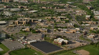 AX129_067E - 5.5K aerial stock footage of passing the University of Utah campus buildings, Salt Lake City, Utah