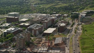 AX129_072 - 5.5K aerial stock footage of flying by University of Utah Hospital buildings, Salt Lake City, Utah