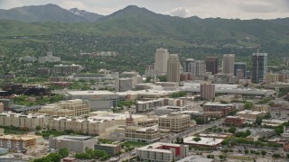 AX130_006E - 5.5K aerial stock footage of flying by Downtown Salt Lake City, Utah State Capitol