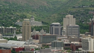 AX130_008E - 5.5K aerial stock footage of Utah State Capitol on Capitol Hill and Downtown Salt Lake City, Utah