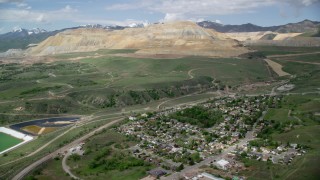 AX130_030 - 5.5K aerial stock footage of approaching Bingham Canyon Mine (Kennecott Copper Mine), Copperton, Utah