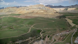 AX130_032 - 5.5K aerial stock footage of flying toward Bingham Canyon Mine (Kennecott Copper Mine), Copperton, Utah